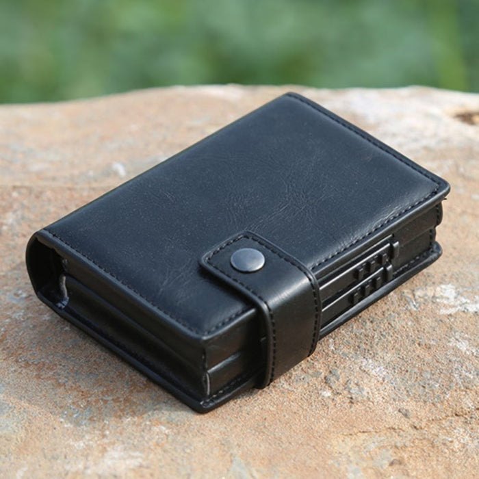 Blessing Sells black leather RFID blocking wallet with auto pop-up mechanism and snap closure.