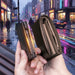 Blessing Sells black carbon fiber RFID pop-up wallet with metal card holder and zipper pocket