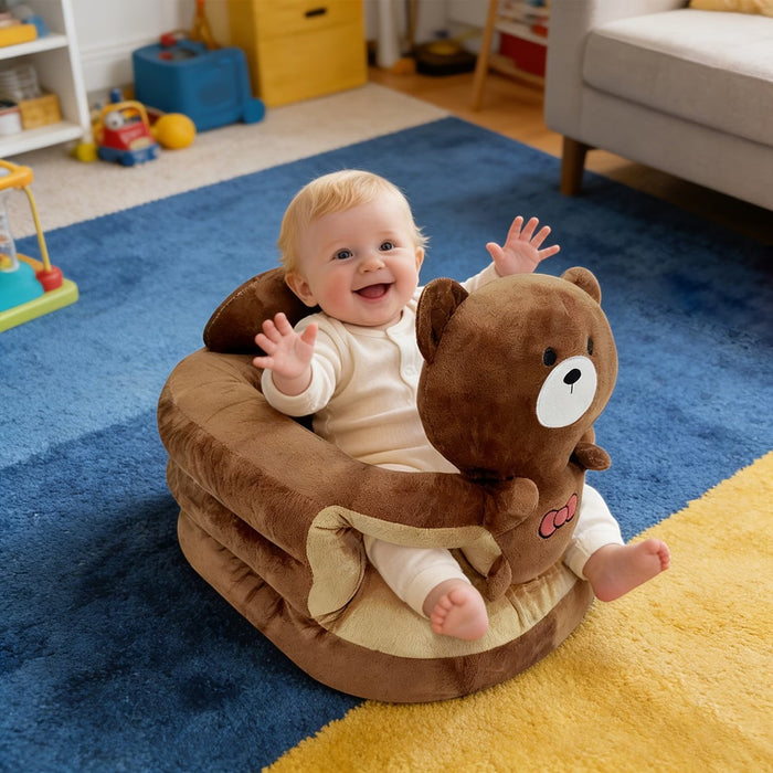 Blessing Sells brown plush toddler seat with bear design, featuring back support for infants learning to sit.