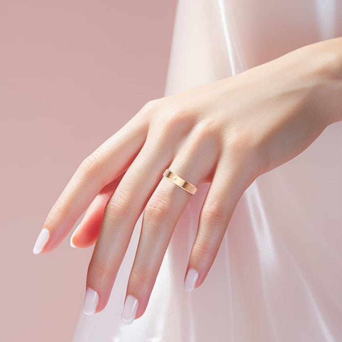 Blessing Sells CHABAIDAO rose gold smart ring with small diamonds, worn on a manicured hand.