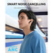 Blessing SellsHere Soundcore P40i by Anker black wireless earbuds with adaptive ANC, worn by a man on a train.