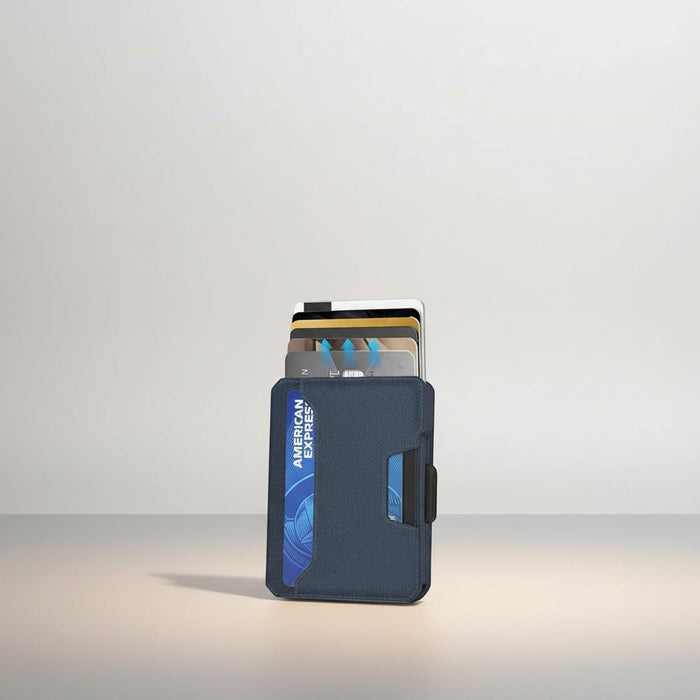 Blessing Sells navy blue double fold metal card case with faux leather trim, RFID shielded, holds multiple cards.