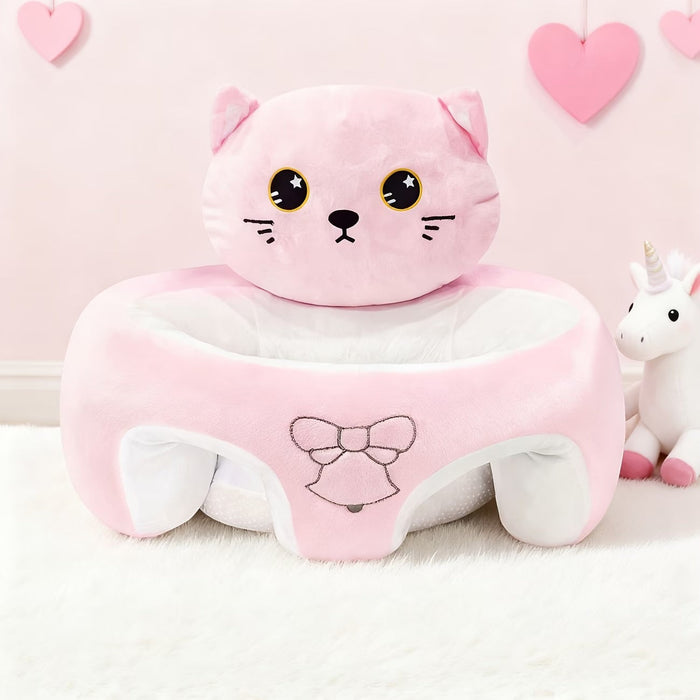 Blessing Sells pink plush toddler seat shaped like a cat with embroidered bow. Supports baby learning to sit.