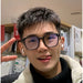 Blessing Sells unisex full-frame matte black smart glasses with color-changing photosensitive lenses and anti-blue light.