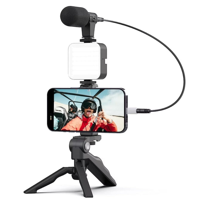 Blessing Sells smartphone vlogging kit with microphone and LED light on tripod. Includes phone mount and mini tripod for stable shots.