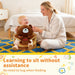 Blessing Sells brown plush teddy bear toddler seat with back support, for babies learning to sit.